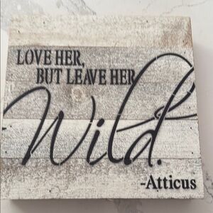 Love her but leave her wild plaque